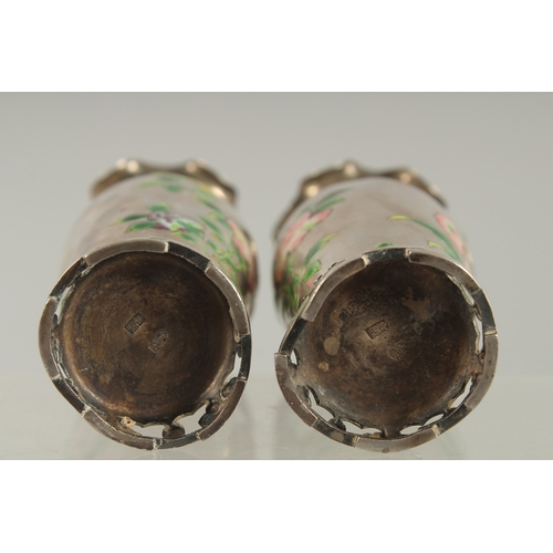 131 - A FINE PAIR OF CHINESE ENAMELLED SILVER VASES, each decorated with enamelled floral sprays, the neck... 