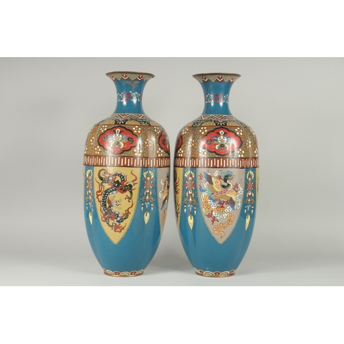 134 - A LARGE PAIR OF LATE 19TH - EARLY 20TH CENTURY JAPANESE CLOISONNE VASES, decorated with panels of st... 