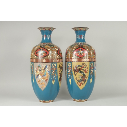 134 - A LARGE PAIR OF LATE 19TH - EARLY 20TH CENTURY JAPANESE CLOISONNE VASES, decorated with panels of st... 