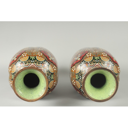 134 - A LARGE PAIR OF LATE 19TH - EARLY 20TH CENTURY JAPANESE CLOISONNE VASES, decorated with panels of st... 