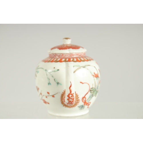 144 - A FINE JAPANESE KUTANI PORCELAIN MINIATURE TEAPOT, painted with flora and embellished with gilt high... 