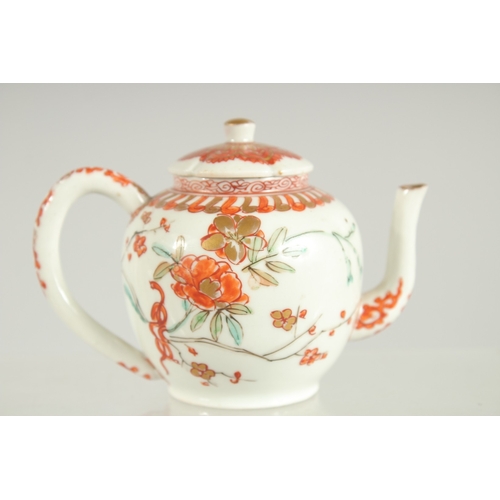 144 - A FINE JAPANESE KUTANI PORCELAIN MINIATURE TEAPOT, painted with flora and embellished with gilt high... 