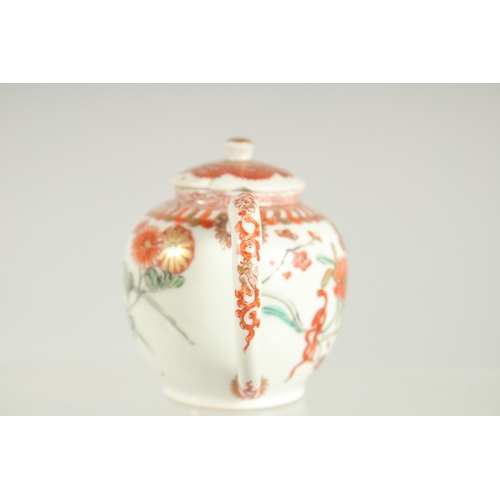 144 - A FINE JAPANESE KUTANI PORCELAIN MINIATURE TEAPOT, painted with flora and embellished with gilt high... 