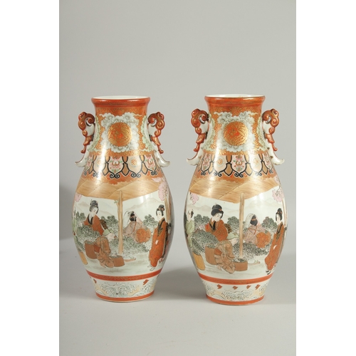 146 - A FINE PAIR OF JAPANESE KUTANI PORCELAIN TWIN HANDLE VASES, painted with a continuous scene depictin... 