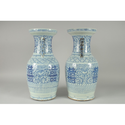 150 - A PAIR OF 19TH CENTURY CHINESE BLUE AND WHITE PORCELAIN VASES, with moulded twin handles in the form... 