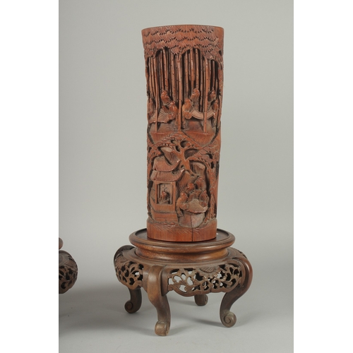 152 - A LARGE PAIR OF 19TH CENTURY CHINESE CARVED BAMBOO VASES, together with carved and pierced hardwood ... 