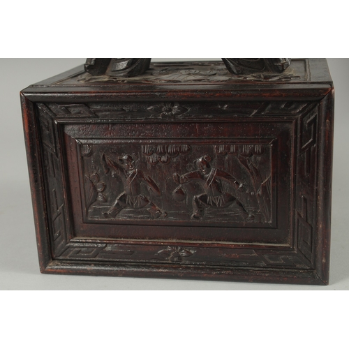 153 - A GOOD 19TH CENTURY CHINESE MAHJONG GAME SET IN A CARVED HARDWOOD BOX, with carved bone counters, 22... 