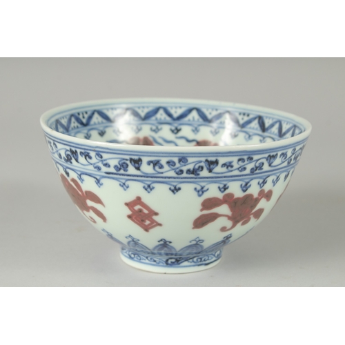 158 - A CHINESE BLUE AND WHITE WITH UNDERGLAZE RED PORCELAIN BOWL, the base with six-character Ming mark -... 