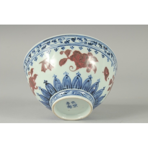 158 - A CHINESE BLUE AND WHITE WITH UNDERGLAZE RED PORCELAIN BOWL, the base with six-character Ming mark -... 