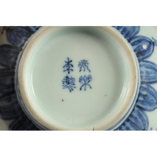 158 - A CHINESE BLUE AND WHITE WITH UNDERGLAZE RED PORCELAIN BOWL, the base with six-character Ming mark -... 