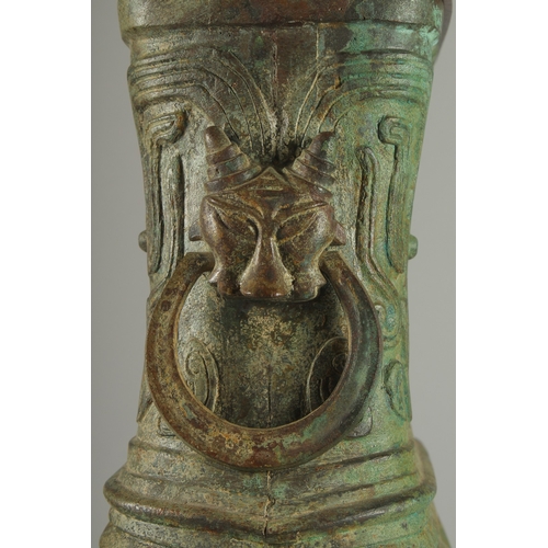 160 - A SUPERB LARGE CHINESE ARCHAIC-DESIGN HEAVY BRONZE VASE LAMP, with hardwood mounts, the vase relief-... 