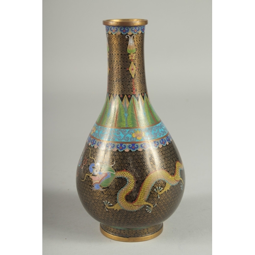 164 - A CHINESE CLOISONNE DRAGON VASE, with two dragon and the flaming pearl of wisdom, 22cm high.