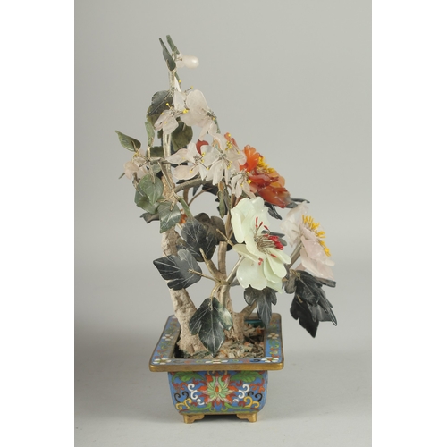 167 - A CHINESE HARDSTONE BONSAI TREE IN A CLOISONNE PLANTER, the petals with carved jade and other stones... 