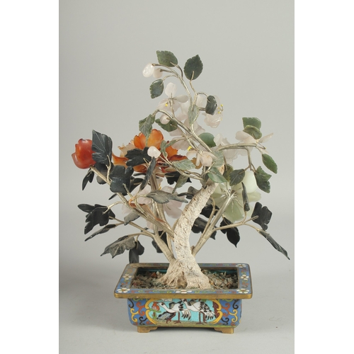 167 - A CHINESE HARDSTONE BONSAI TREE IN A CLOISONNE PLANTER, the petals with carved jade and other stones... 