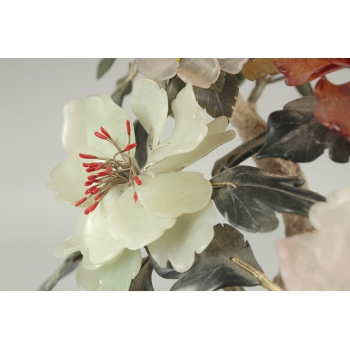 167 - A CHINESE HARDSTONE BONSAI TREE IN A CLOISONNE PLANTER, the petals with carved jade and other stones... 