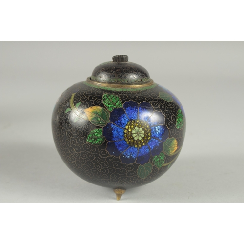 169 - A CHINESE BLACK GROUND CLOISONNE JAR AND COVER, with glittered enamel flowers, 11cm high.