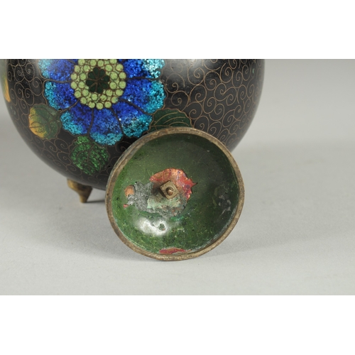 169 - A CHINESE BLACK GROUND CLOISONNE JAR AND COVER, with glittered enamel flowers, 11cm high.