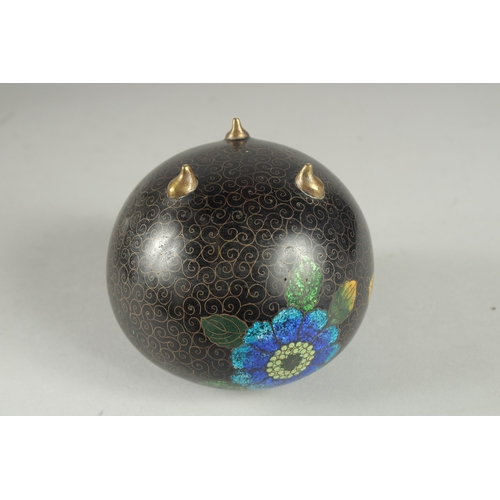 169 - A CHINESE BLACK GROUND CLOISONNE JAR AND COVER, with glittered enamel flowers, 11cm high.