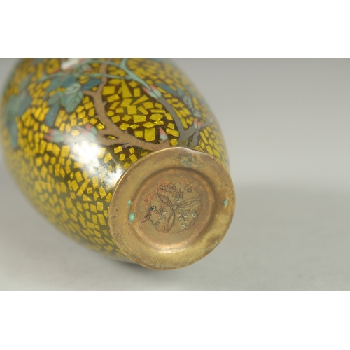 171 - A JAPANESE YELLOW GROUND GLITTERED ENAMEL CLOISONNE VASE, decorated with a flower, with character ma... 