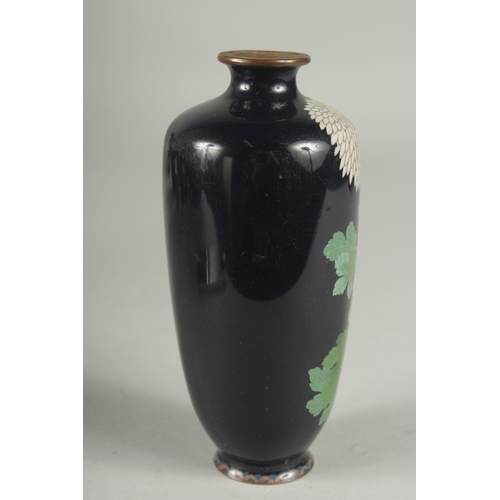 172 - A JAPANESE CLOISONNE VASE, decorated with flora, (lacking base), 15cm high.