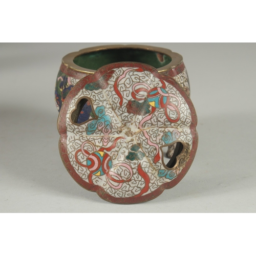 174 - A CHINESE CLOISONNE TRIPOD CENSER AND COVER, decorated with foo dogs and stylised clouds, 10cm high.