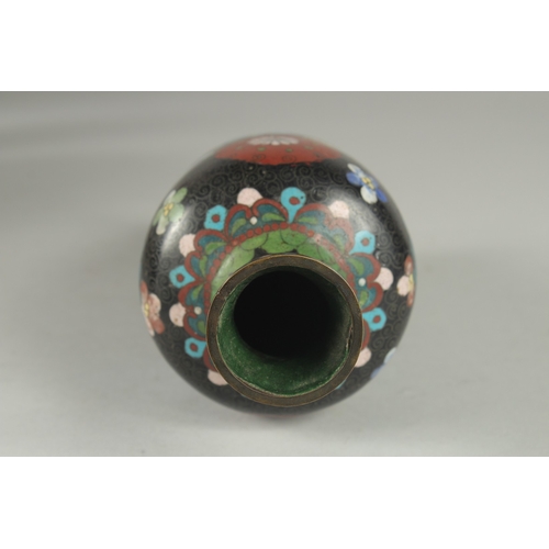 175 - A JAPANESE BLACK GROUND CLOISONNE VASE, with decorative floral roundels and green scale pattern, 21.... 