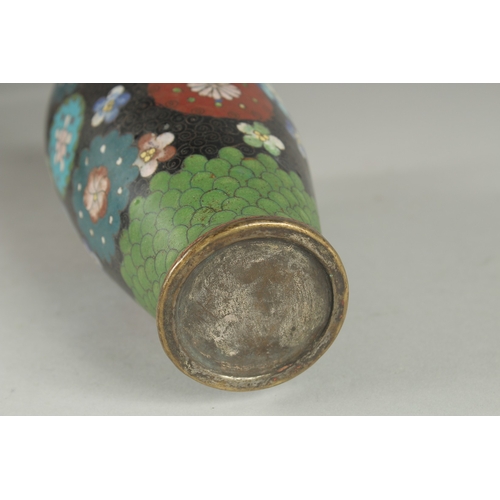 175 - A JAPANESE BLACK GROUND CLOISONNE VASE, with decorative floral roundels and green scale pattern, 21.... 