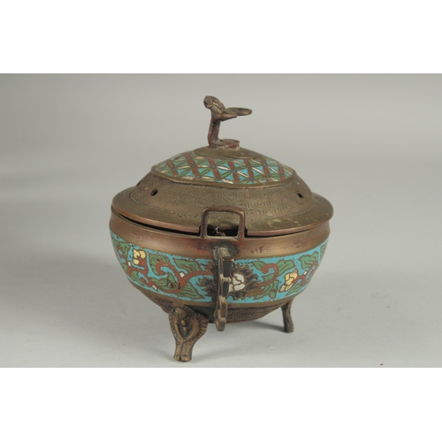 176 - A CHINESE CHAMPLEVE ENAMEL CLOISONNE CENSER AND COVER, raised on tripod legs, 15cm high.