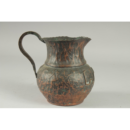 177 - AN UNUSUAL CHINESE COPPER JUG, 18.5cm high.