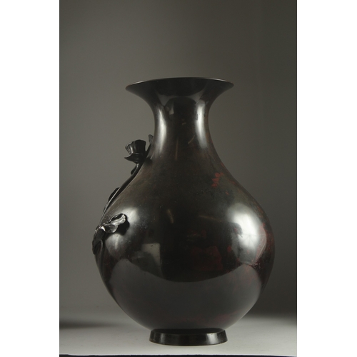 183 - A LARGE JAPANESE MEIJI PERIOD BRONZE VASE, with relief decoration depicting an egret and frog amongs... 