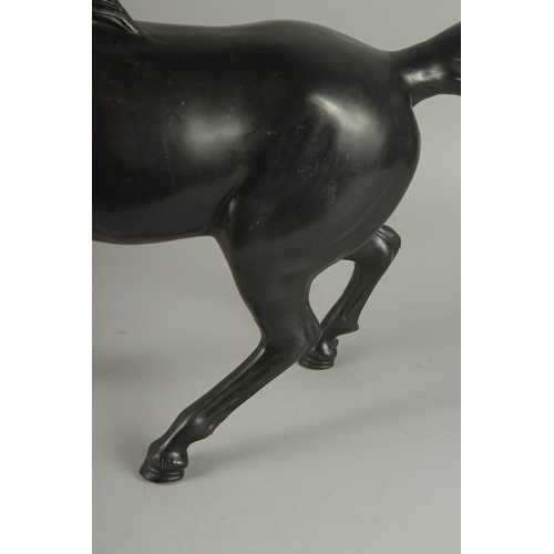 186 - A LARGE JAPANESE TAISHO / SHOWA SIGNED BRONZE HORSE, in a cantering pose, engraved signature to the ... 