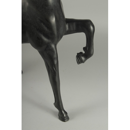 186 - A LARGE JAPANESE TAISHO / SHOWA SIGNED BRONZE HORSE, in a cantering pose, engraved signature to the ... 