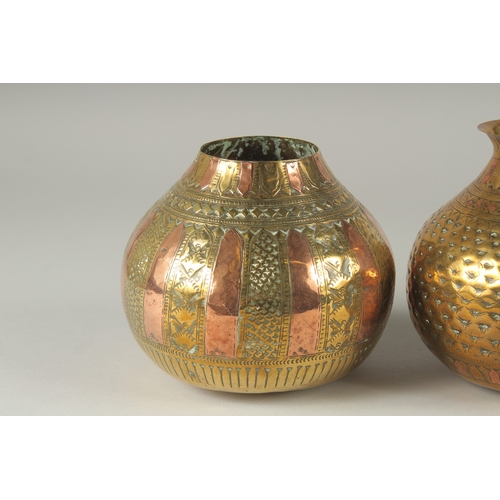 201 - A COLLECTION OF THREE SOUTH INDIAN MIXED METAL LOTA VESSELS, each approximately 14cm high, (3).