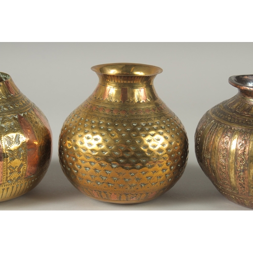 201 - A COLLECTION OF THREE SOUTH INDIAN MIXED METAL LOTA VESSELS, each approximately 14cm high, (3).