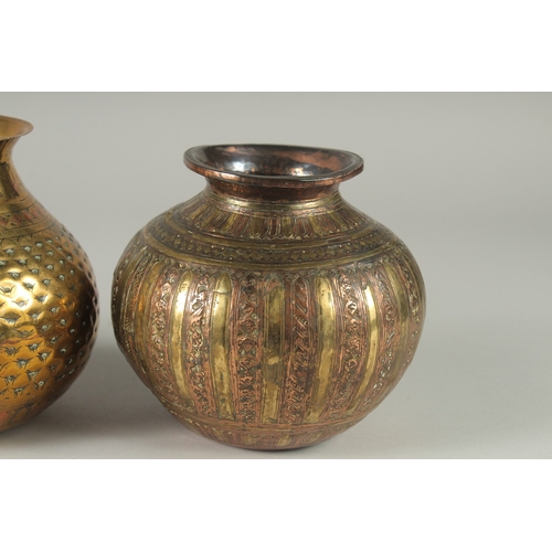 201 - A COLLECTION OF THREE SOUTH INDIAN MIXED METAL LOTA VESSELS, each approximately 14cm high, (3).