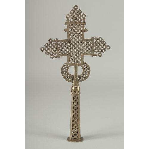 207 - A 19TH CENTURY ETHIOPIAN COPTIC WHITE METAL CROSS, 31cm high.