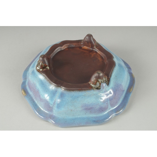 208 - A CHINESE LIGHT BLUE MONOCHROME GLAZED FOOTED DISH, 19.5cm wide.