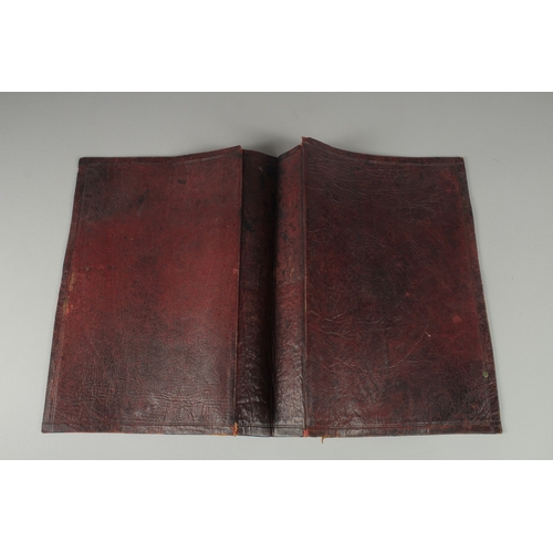 210 - A FINE 19TH CENTURY POSSIBLY MOROCCAN OR OTTOMAN TOOLED LEATHER DOCUMENT HOLDER, 32.5cm x 25cm.