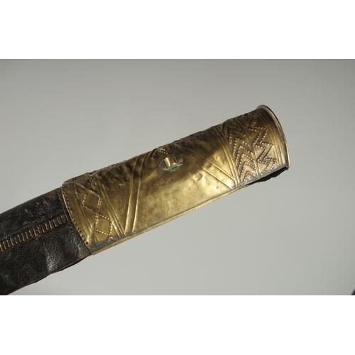 212 - A FINE 19TH CENTURY OTTOMAN TURKISH YATAGHAN SWORD with coral inset walrus handle and silver inlaid ... 