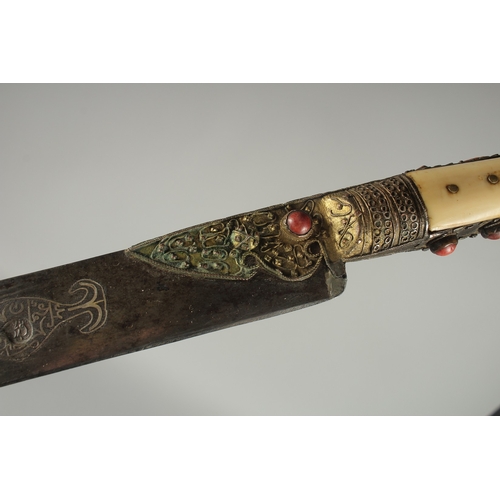 212 - A FINE 19TH CENTURY OTTOMAN TURKISH YATAGHAN SWORD with coral inset walrus handle and silver inlaid ... 