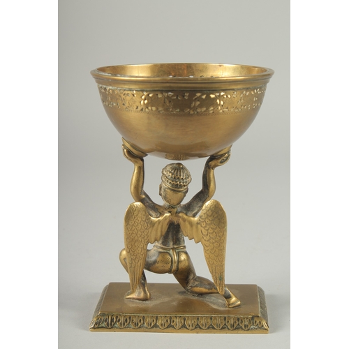 213 - A FINE 19TH CENTURY INDIAN BRASS OFFERING BOWL WITH A GARUDA BASE, 17.5cm high.