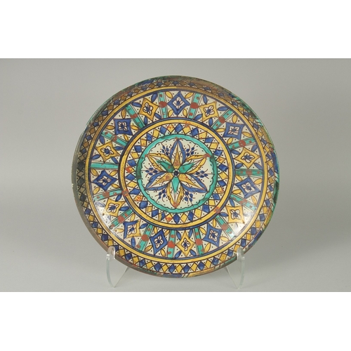 227 - A COLLECTION OF THREE 19TH CENTURY MOROCCAN GLAZED POTTERY CHARGERS, with graduating sizes, 43cm, 34... 