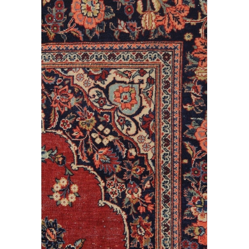 237 - A FINE PERSIAN KASHAN RUG.