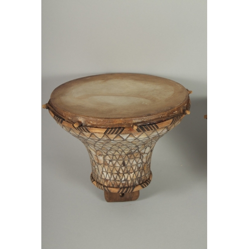 246 - A PAIR OF 18TH-19TH CENTURY OTTOMAN MOTHER OF PEARL INLAID DRUMS, drum surface 21cm diameter.