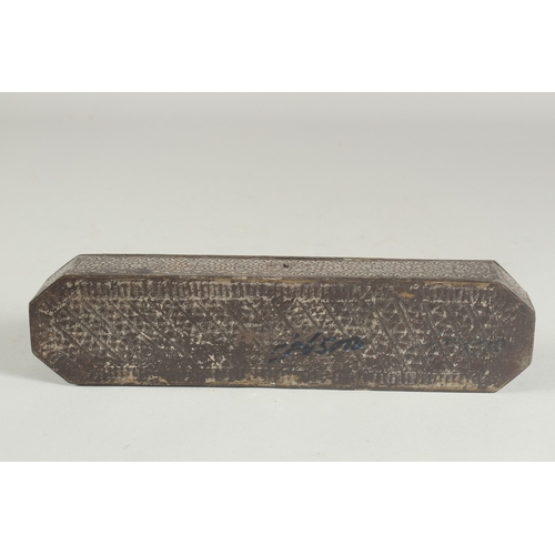 254 - AN EARLY 19TH CENTURY INDIAN SILVER INLAID STEEL PEN BOX, 27cm long.