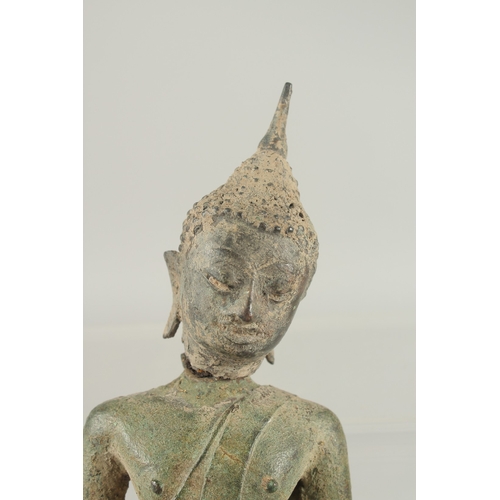 259 - A RARE POSSIBLY 11TH-12TH CENTURY SOUTH EAST ASIAN BRONZE BUDDHA, possibly Thai, with traces of orig... 