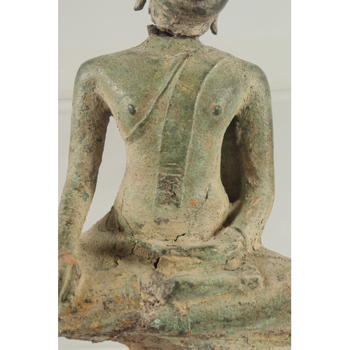 259 - A RARE POSSIBLY 11TH-12TH CENTURY SOUTH EAST ASIAN BRONZE BUDDHA, possibly Thai, with traces of orig... 