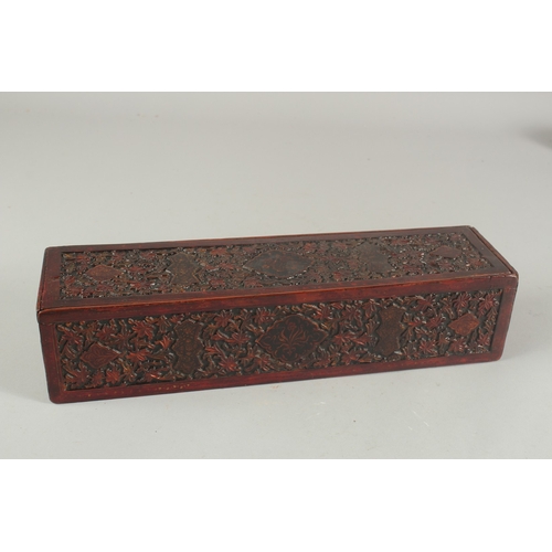 261 - A RARE 18TH CENTURY MUGHAL INDIAN CARVED PAINTED AND LACQUERED WOODEN PEN BOX, 36cm x 9cm.