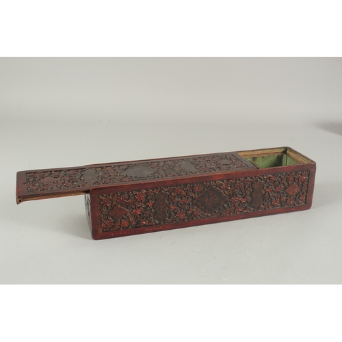 261 - A RARE 18TH CENTURY MUGHAL INDIAN CARVED PAINTED AND LACQUERED WOODEN PEN BOX, 36cm x 9cm.