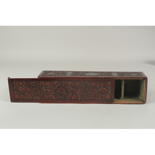 261 - A RARE 18TH CENTURY MUGHAL INDIAN CARVED PAINTED AND LACQUERED WOODEN PEN BOX, 36cm x 9cm.